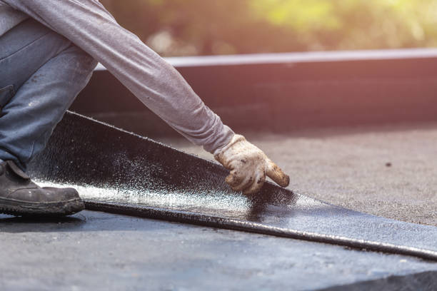Professional Basement Waterproofing technician working in Bethesda, OH